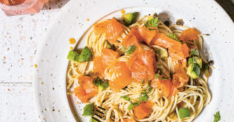 Chilled smoked salmon spaghetti with capers and avocado pairs well with sparkling rosé or Champagne.