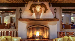 Fireplace and Cow Skull at Inn at Loretto